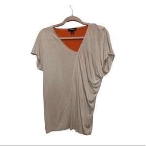 Trouve asymmetrical orange and cream top